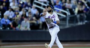 NEW YORK, NEW YORK - SEPTEMBER 24: Amed Rosario #1 of the New York Mets sends the ball to first for the out on a hit by Miguel Rojas of hte Miami Marlins in the fourth inning at Citi Field on September 24, 2019 in the Flushing neighborhood of the Queens borough of New York City.