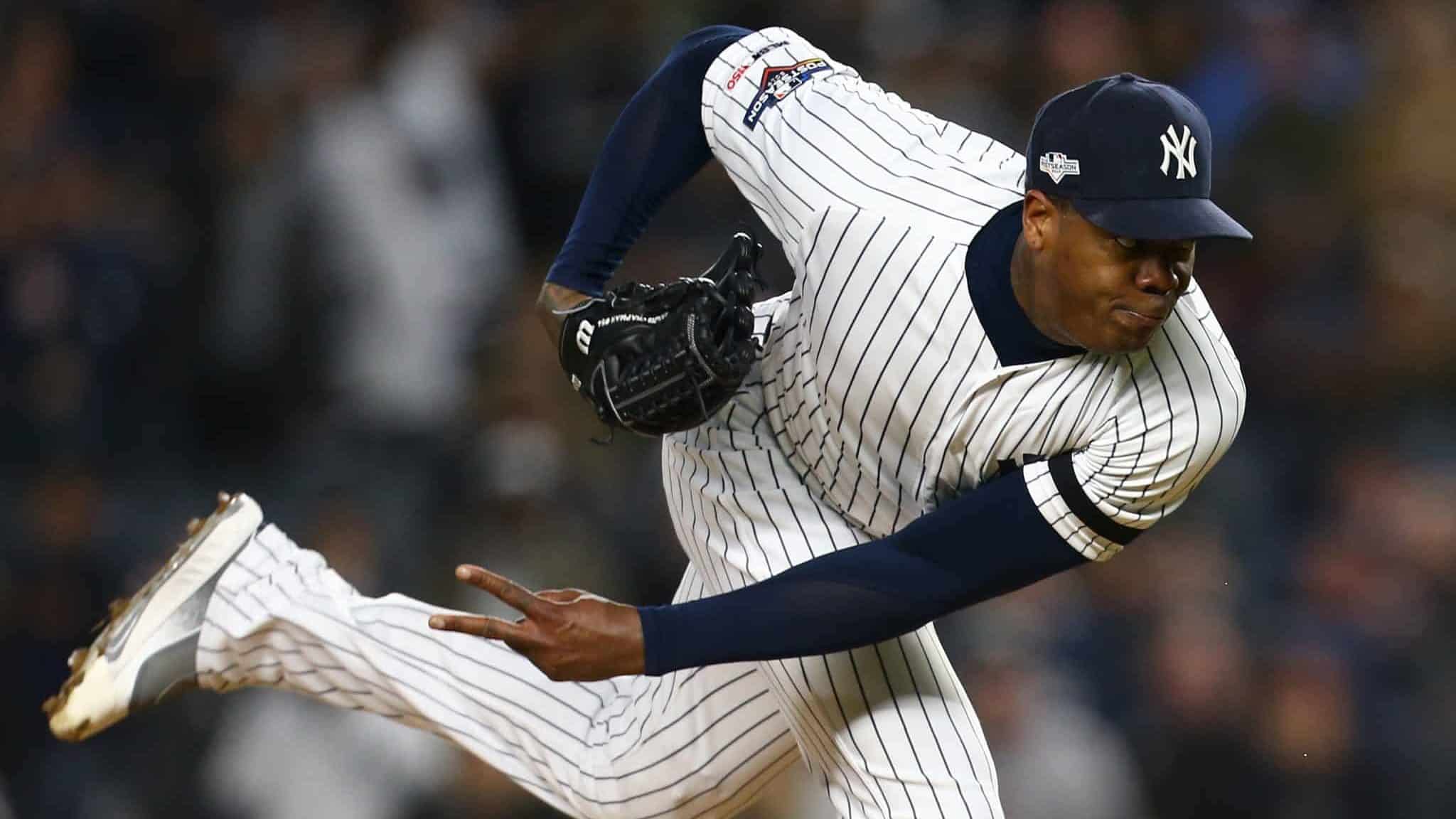 NEW YORK, NEW YORK - OCTOBER 18: Aroldis Chapman #54 of the New York Yankees throws a pitch against the Houston Astros during the ninth inning in game five of the American League Championship Series at Yankee Stadium on October 18, 2019 in New York City.