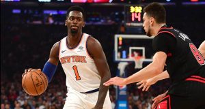 NEW YORK, NEW YORK - OCTOBER 28: Bobby Portis #1 of the New York Knicks brings the ball up court against Zach LaVine #8 of the Chicago Bulls in the first half at Madison Square Garden on October 28, 2019 in New York City. NOTE TO USER: User expressly acknowledges and agrees that, by downloading and or using this Photograph, user is consenting to the terms and conditions of the Getty Images License Agreement.