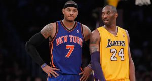 LOS ANGELES, CA - DECEMBER 29: Carmelo Anthony #7 of the New York Knicks and Kobe Bryant #24 of the Los Angeles Lakers talk during the first half at Staples Center on December 29, 2011 in Los Angeles, California. NOTE TO USER: User expressly acknowledges and agrees that, by downloading and or using this photograph, User is consenting to the terms and conditions of the Getty Images License Agreement.