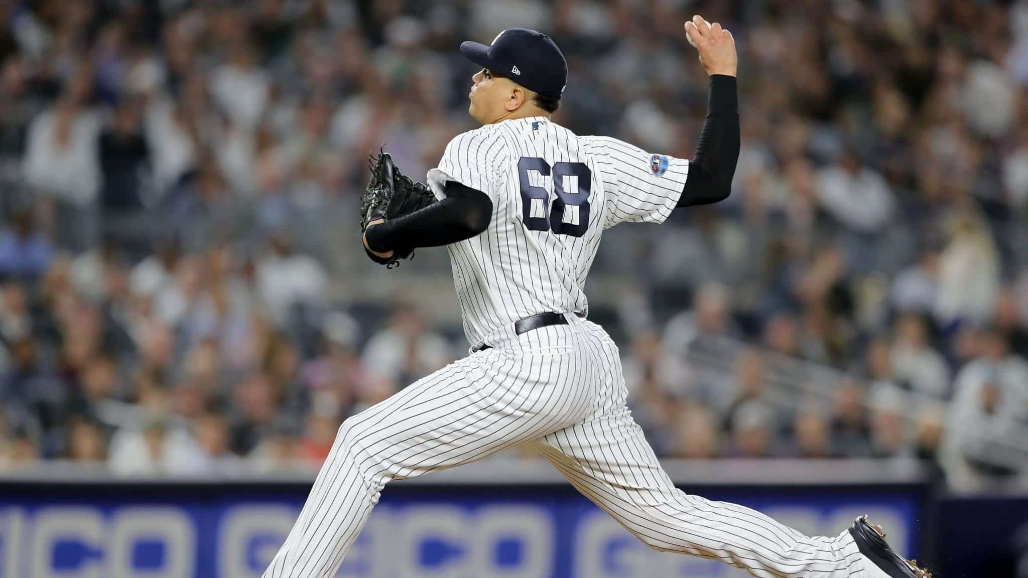 NEW YORK, NEW YORK - OCTOBER 03: Dellin Betances #68 of the New York Yankees throws a pitch against the Oakland Athletics during the fifth inning in the American League Wild Card Game at Yankee Stadium on October 03, 2018 in the Bronx borough of New York City.