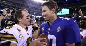 EAST RUTHERFORD, NEW JERSEY - SEPTEMBER 30: Drew Brees #9 of the New Orleans Saints and Eli Manning #10 of the New York Giants meet after their game at MetLife Stadium on September 30, 2018 in East Rutherford, New Jersey.