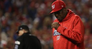 WASHINGTON, DC - OCTOBER 12: Dusty Baker #12 of the Washington Nationals looks on against the Chicago Cubs during the fifth inning in game five of the National League Division Series at Nationals Park on October 12, 2017 in Washington, DC.