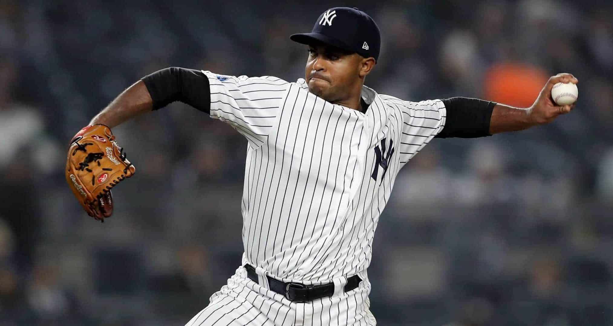 NEW YORK, NEW YORK - OCTOBER 08: Stephen Tarpley #71 of the New York Yankees throws a pitch against the Boston Red Sox during the eighth inning in Game Three of the American League Division Series at Yankee Stadium on October 08, 2018 in the Bronx borough of New York City.