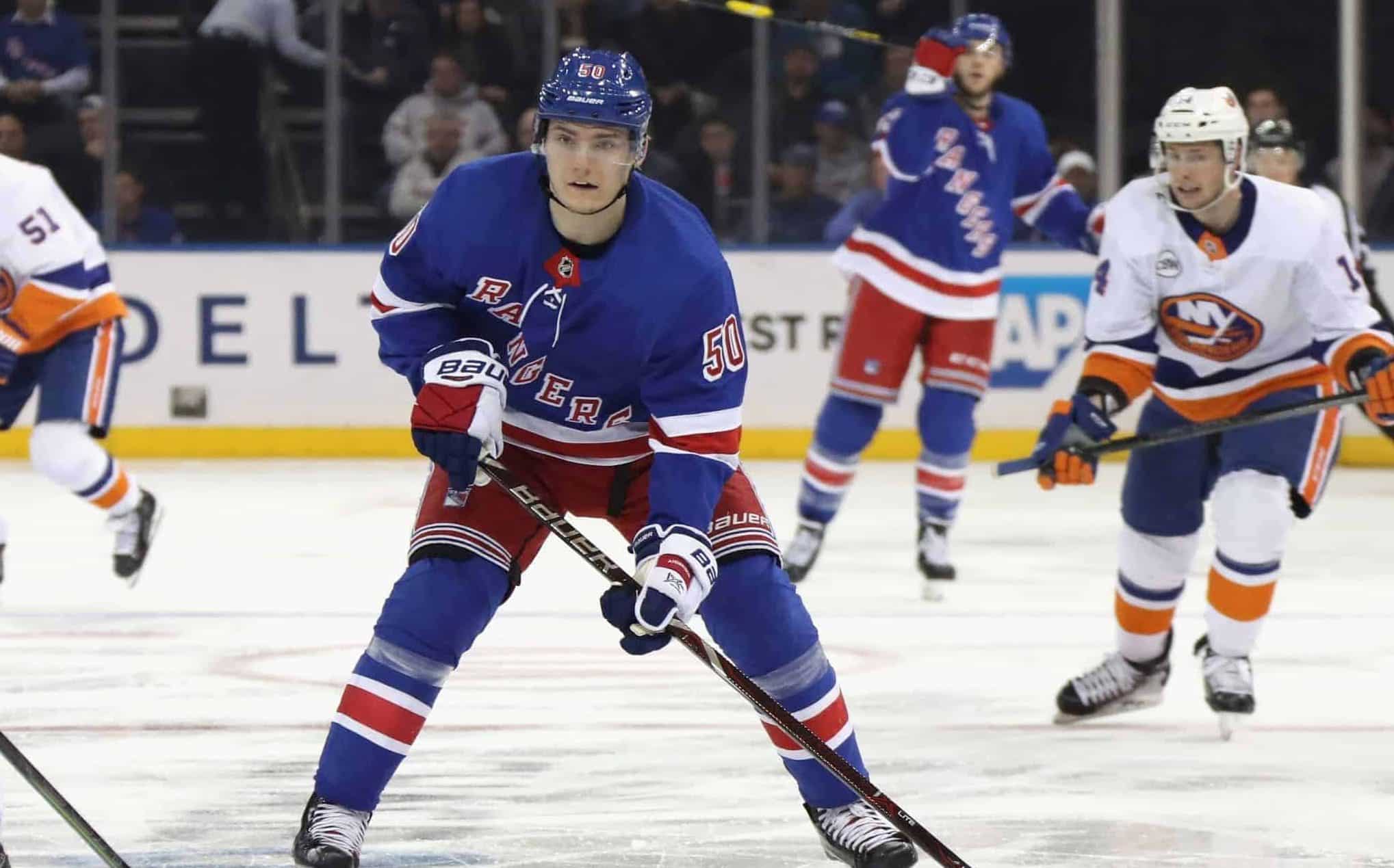 NEW YORK, NEW YORK - NOVEMBER 21: Lias Andersson #50 of the New York Rangers skates against the New York Islanders at Madison Square Garden on November 21, 2018 in New York City. The Rangers shut out the Islanders 5-0.