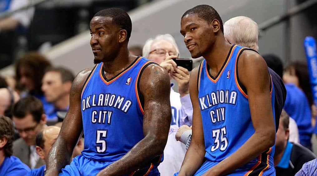 DALLAS, TX - MAY 19: Kendrick Perkins #5 and Kevin Durant #35 of the Oklahoma City Thunder wait to enter the game in the third quarter while taking on the Dallas Mavericks in Game Two of the Western Conference Finals during the 2011 NBA Playoffs at American Airlines Center on May 19, 2011 in Dallas, Texas. NOTE TO USER: User expressly acknowledges and agrees that, by downloading and or using this photograph, User is consenting to the terms and conditions of the Getty Images License Agreement.