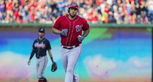WASHINGTON, DC - JUNE 22: Matt Adams #15 of the Washington Nationals rounds the bases after hitting a two-run home run against the Atlanta Braves during the first inning at Nationals Park on June 22, 2019 in Washington, DC.