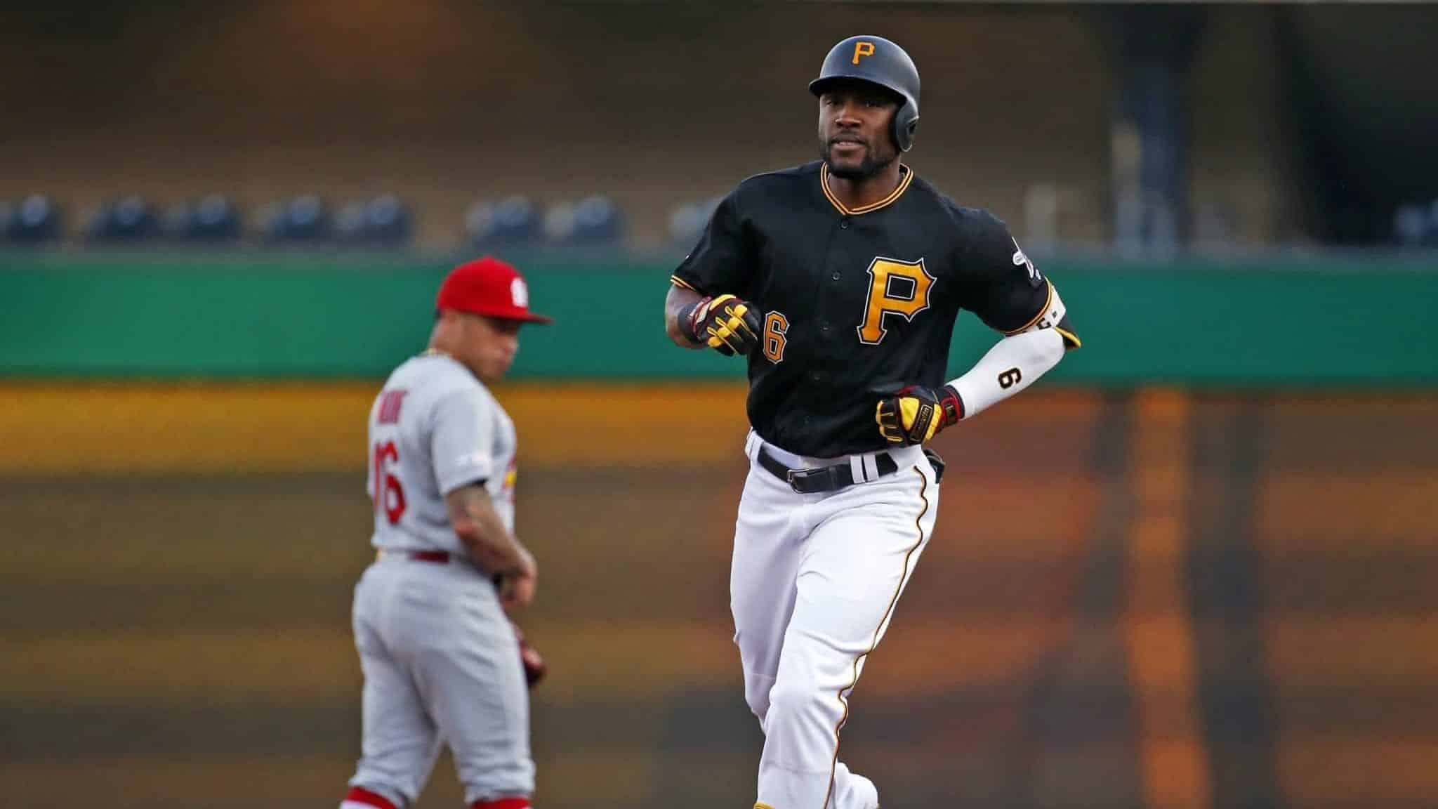PITTSBURGH, PA - JULY 23: Starling Marte #6 of the Pittsburgh Pirates rounds second base after hitting a three-run home run in the first inning against the St. Louis Cardinals at PNC Park on July 23, 2019 in Pittsburgh, Pennsylvania.