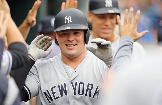 DETROIT, MI - SEPTEMBER 12: Luke Voit #45 of the New York Yankees celebrates in the dugout after hitting a first-inning, two-run home run during game one of a double header against the Detroit Tigers at Comerica Park on September 12, 2019 in Detroit, Michigan.