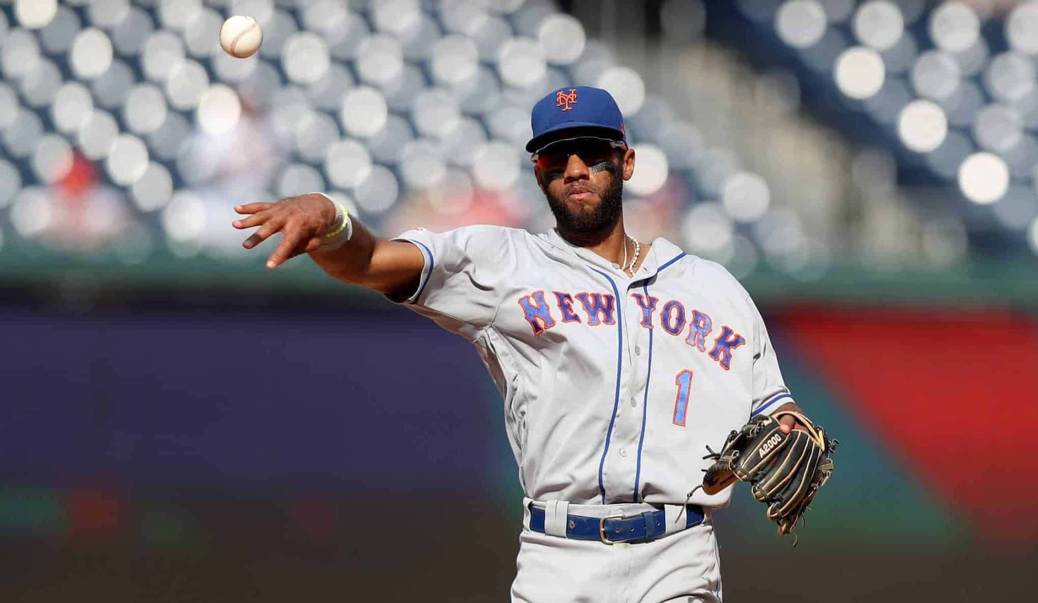 WASHINGTON, DC - SEPTEMBER 04: Amed Rosario #1 of the New York Mets throws the ball in against the Washington Nationals at Nationals Park on September 04, 2019 in Washington, DC.
