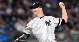 NEW YORK, NEW YORK - SEPTEMBER 20: J.A. Happ #34 of the New York Yankees pitches in the first inning of their game against the Toronto Blue Jays at Yankee Stadium on September 20, 2019 in the Bronx borough of New York City.