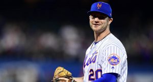 NEW YORK, NEW YORK - SEPTEMBER 26: Pete Alonso #20 of the New York Mets smiles in the third inning of their game against the Miami Marlins at Citi Field on September 26, 2019 in the Flushing neighborhood of the Queens borough in New York City.