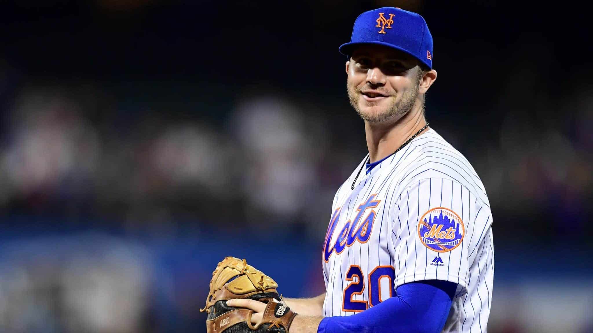 NEW YORK, NEW YORK - SEPTEMBER 26: Pete Alonso #20 of the New York Mets smiles in the third inning of their game against the Miami Marlins at Citi Field on September 26, 2019 in the Flushing neighborhood of the Queens borough in New York City.