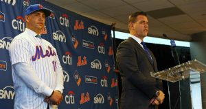 NEW YORK, NY - NOVEMBER 04: Carlos Beltran, left, is introduced by General Manager Brodie Van Wagenen during a press conference at Citi Field on November 4, 2019 in New York City.