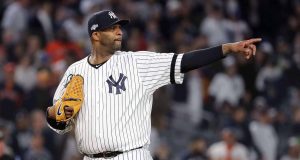 NEW YORK, NEW YORK - OCTOBER 17: CC Sabathia #52 of the New York Yankees reacts against the Houston Astros during the eighth inning in game four of the American League Championship Series at Yankee Stadium on October 17, 2019 in New York City.