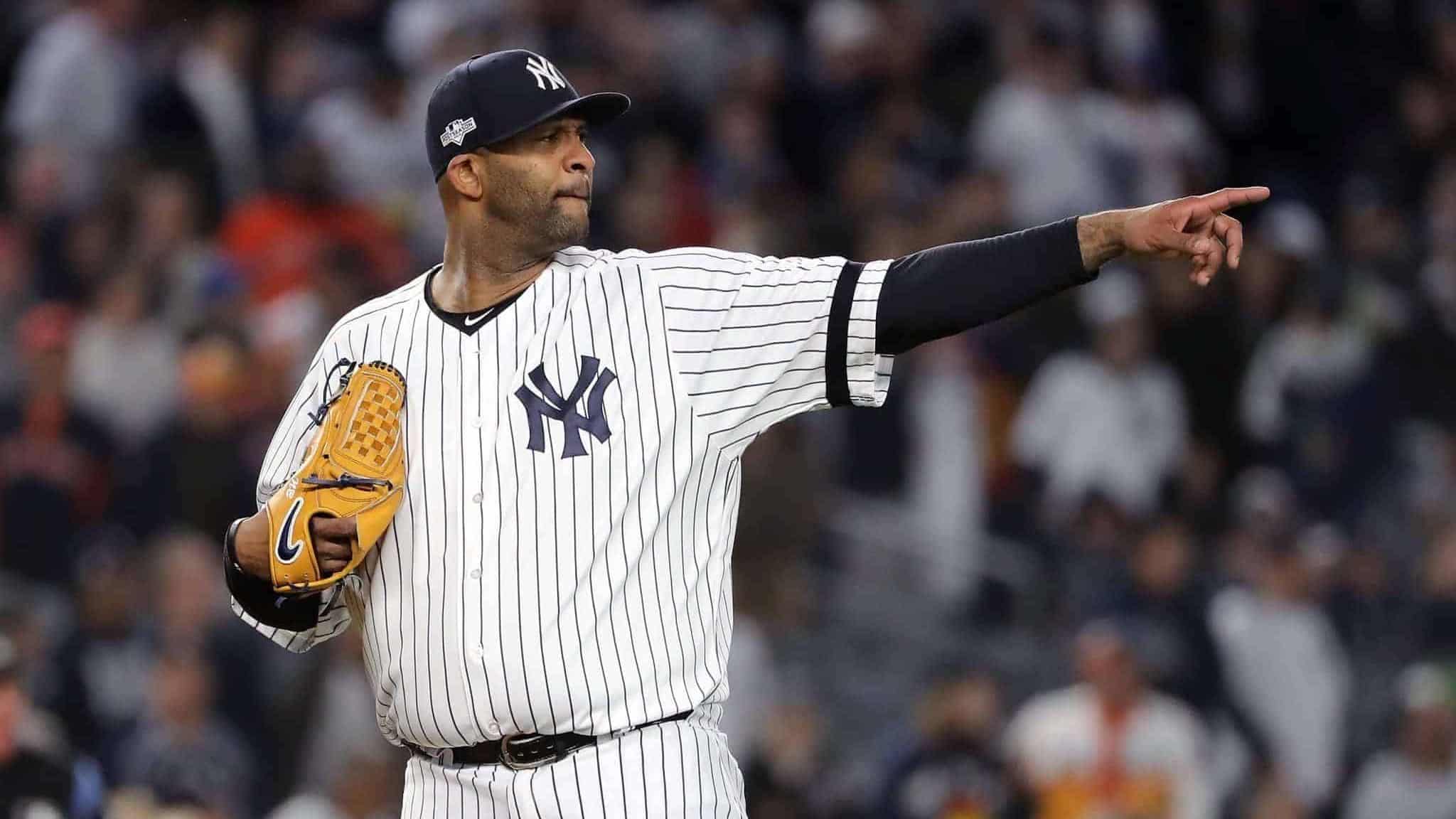 NEW YORK, NEW YORK - OCTOBER 17: CC Sabathia #52 of the New York Yankees reacts against the Houston Astros during the eighth inning in game four of the American League Championship Series at Yankee Stadium on October 17, 2019 in New York City.