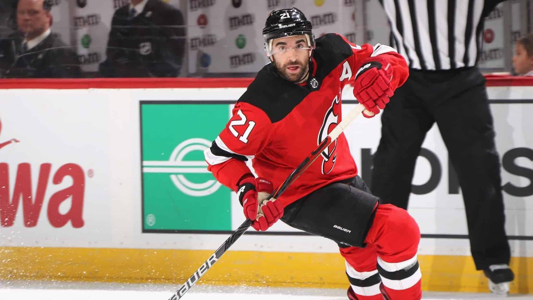 NEWARK, NEW JERSEY - DECEMBER 18: Kyle Palmieri #21 of the New Jersey Devils skates against the Anaheim Ducks at the Prudential Center on December 18, 2019 in Newark, New Jersey.