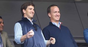 NEW YORK, NY - MAY 04: Eli Manning of the New York Giants and Peyton Manning of the Denver Broncos appear at the game between the New York Yankees and the Tampa Bay Rays on May 4, 2014 in the Bronx borough of New York City.