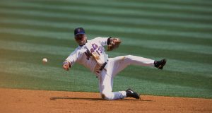 19 Jul 2001: Edgardo Alfonzo #13 of the New York Mets throwing the ball to first base during the game against the Florida Marlins at Shea Stadium in Flushing, New York. The Marlins defeated the Mets 8-3.