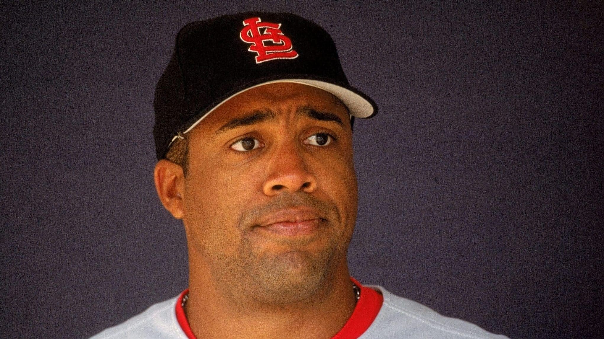 28 Sep 2000: Eduardo Perez #33 of the St. Louis Cardinals looks on from the dugout during the game against the San Diego Padres at the Qualcomm Stadium in San Diego, California. The Cardinals defeated the Padres 7-6.
