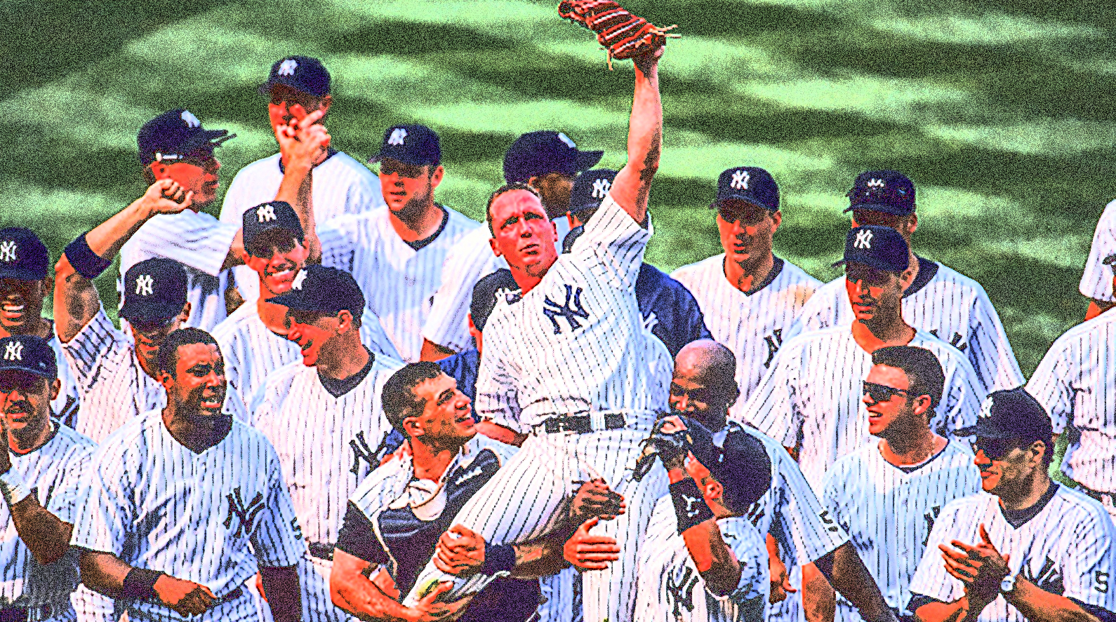 18 Jul 1999: Pitcher David Cone #36 of the New York Yankees is being carried by his teammates after the game against the Montreal Expos at the Yankee Stadium in the Bronx, New York. David Cone pitched a perfect game to allow the Yankees to defeat the Expos 6-0.