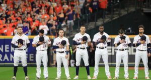 HOUSTON, TEXAS - OCTOBER 29: The Houston Astros stand for the national anthem prior to Game Six of the 2019 World Series against the Washington Nationals at Minute Maid Park on October 29, 2019 in Houston, Texas.