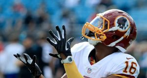 JACKSONVILLE, FLORIDA - DECEMBER 16: Jehu Chesson #16 of the Washington Redskins warms up prior to the game at TIAA Bank Field on December 16, 2018 in Jacksonville, Florida.