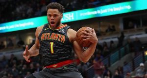CHICAGO, ILLINOIS - JANUARY 23: Justin Anderson #1 of the Atlanta Hawks leaps to catch a pass against the Chicago Bulls at the United Center on January 23, 2019 in Chicago, Illinois. NOTE TO USER: User expressly acknowledges and agrees that, by downloading and or using this photograph, User is consenting to the terms and conditions of the Getty Images License Agreement.