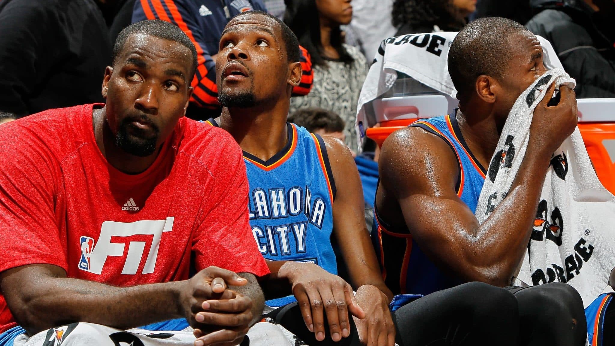 ATLANTA, GA - JANUARY 23: Kendrick Perkins #5, Kevin Durant #35 and Serge Ibaka #9 of the Oklahoma City Thunder sit in the final seconds of their 103-93 loss to the Atlanta Hawks at Philips Arena on January 23, 2015 in Atlanta, Georgia. NOTE TO USER: User expressly acknowledges and agrees that, by downloading and or using this photograph, User is consenting to the terms and conditions of the Getty Images License Agreement.