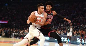 NEW YORK, NEW YORK - OCTOBER 28: Kevin Knox II #20 of the New York Knicks drives against Otto Porter Jr. #22 of the Chicago Bulls in the first half at Madison Square Garden on October 28, 2019 in New York City. NOTE TO USER: User expressly acknowledges and agrees that, by downloading and or using this Photograph, user is consenting to the terms and conditions of the Getty Images License Agreement.