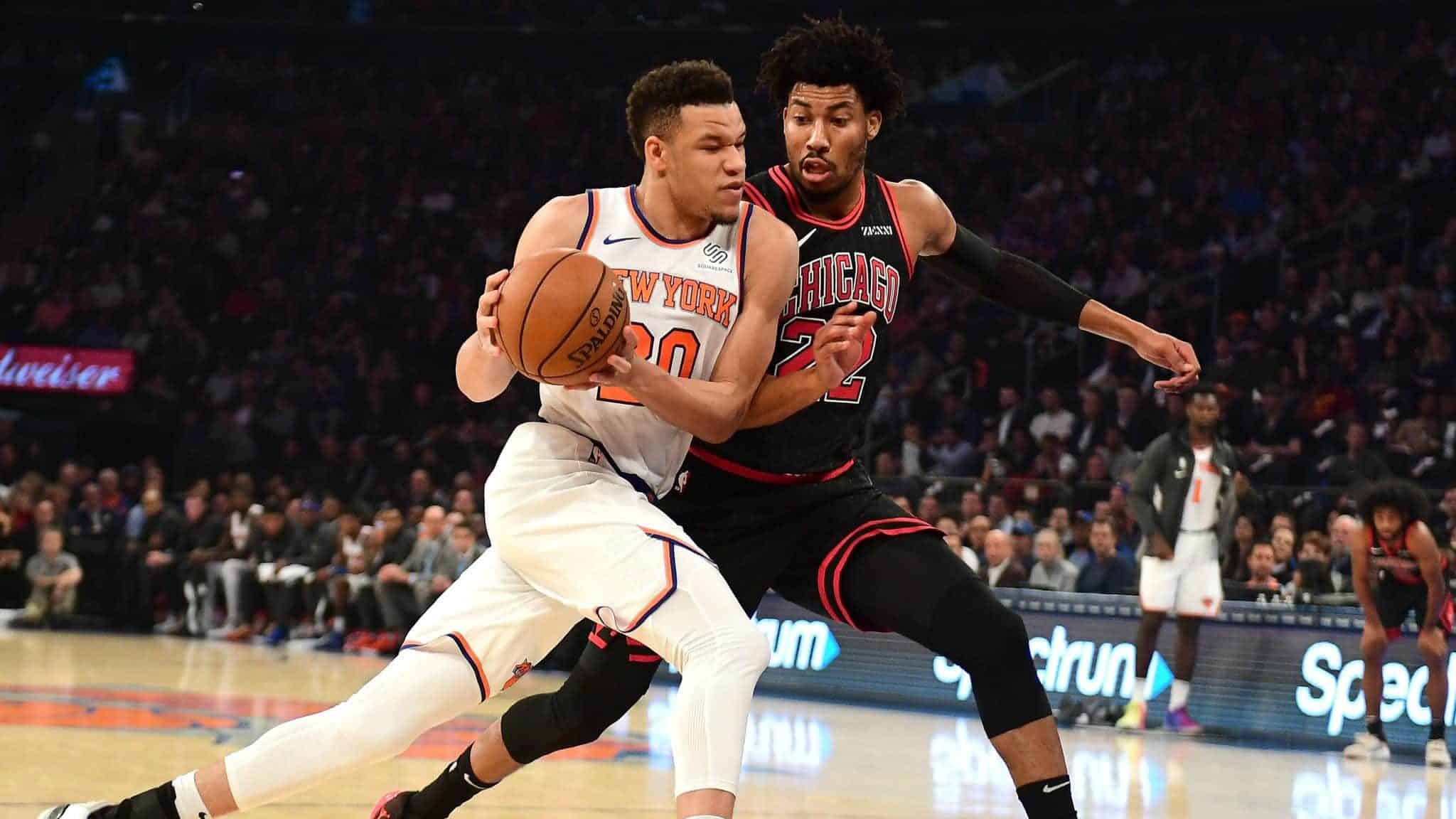 NEW YORK, NEW YORK - OCTOBER 28: Kevin Knox II #20 of the New York Knicks drives against Otto Porter Jr. #22 of the Chicago Bulls in the first half at Madison Square Garden on October 28, 2019 in New York City. NOTE TO USER: User expressly acknowledges and agrees that, by downloading and or using this Photograph, user is consenting to the terms and conditions of the Getty Images License Agreement.