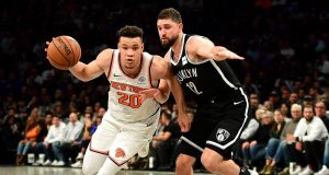 NEW YORK, NEW YORK - OCTOBER 25: Joe Harris #12 of the Brooklyn Nets guards Kevin Knox II #20 of the New York Knicks as he dribbles the ball during the second half of their game at Barclays Center on October 25, 2019 in the Brooklyn borough of New York City. NOTE TO USER: User expressly acknowledges and agrees that, by downloading and or using this photograph, User is consenting to the terms and conditions of the Getty Images License Agreement.
