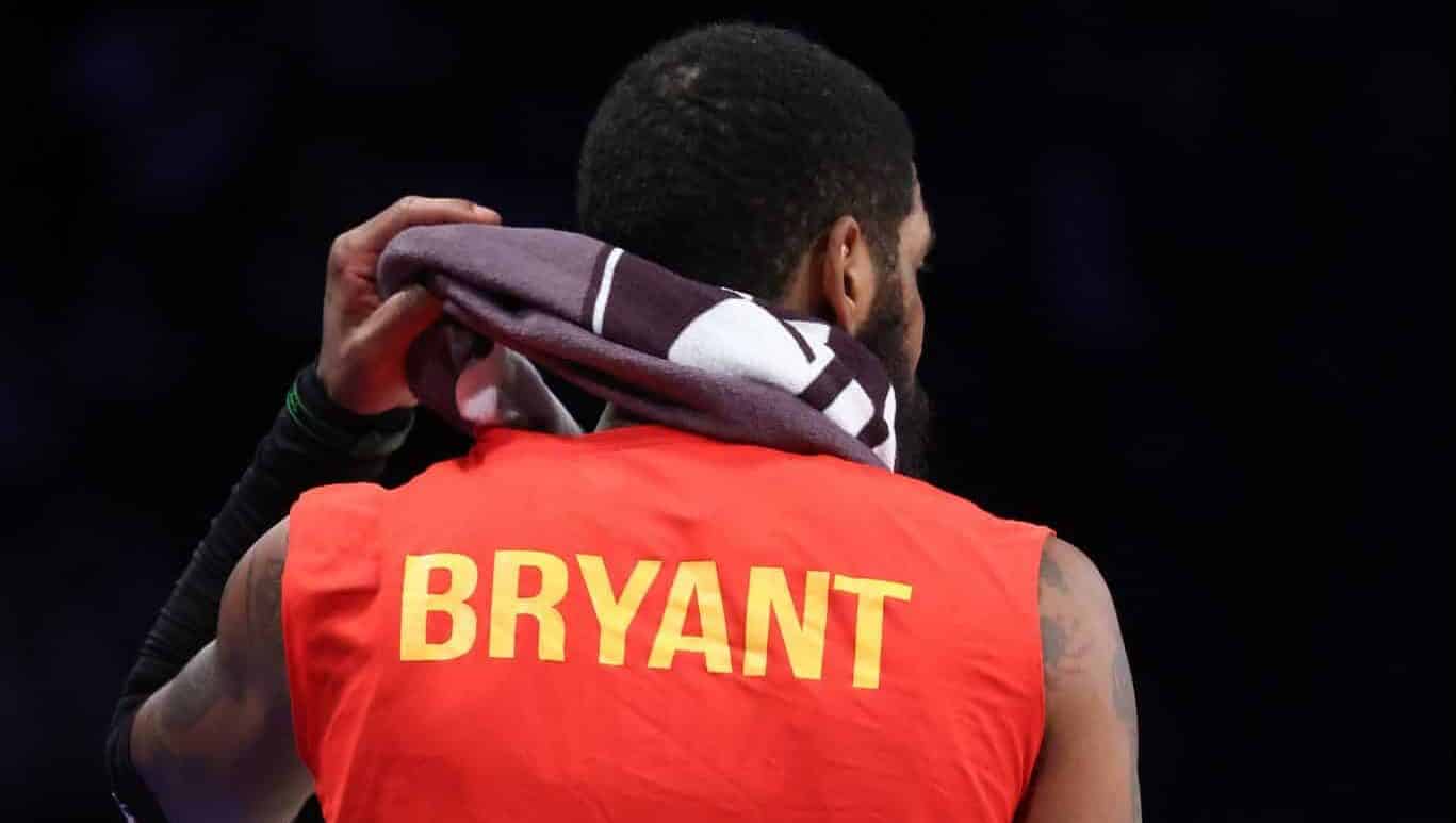 NEW YORK, NEW YORK - JANUARY 29: Kyrie Irving #11 of the Brooklyn Nets wears a Kobe Bryant warmup shirt against the Detroit Pistonsduring their game at Barclays Center on January 29, 2020 in New York City.