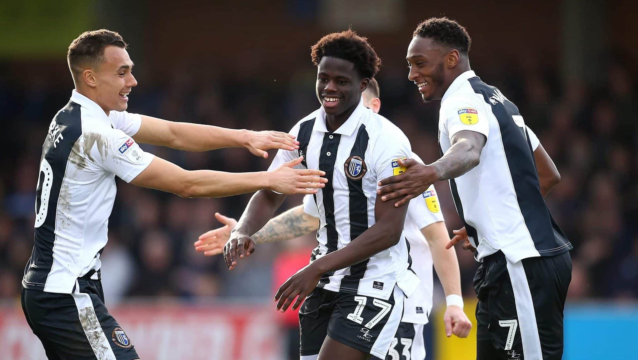 KINGSTON UPON THAMES, ENGLAND - MARCH 23: Leonardo Da Silva Lopes of Gillingham celebrates with his teammates after scoring his sides third goal during the Sky Bet League One match between AFC Wimbledon and Gillingham at The Cherry Red Records Stadium on March 23, 2019 in Kingston upon Thames, United Kingdom.