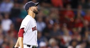 BOSTON, MASSACHUSETTS - SEPTEMBER 03: Rick Porcello #22 of the Boston Red Sox reacts after allowing two runs during the third inning against the Minnesota Twins at Fenway Park on September 03, 2019 in Boston, Massachusetts.