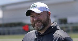 New York Jets general manager Joe Douglas greets reporters during a practice at the team's NFL football training facility in Florham Park, N.J., Tuesday, June 11, 2019. Robert Saleh