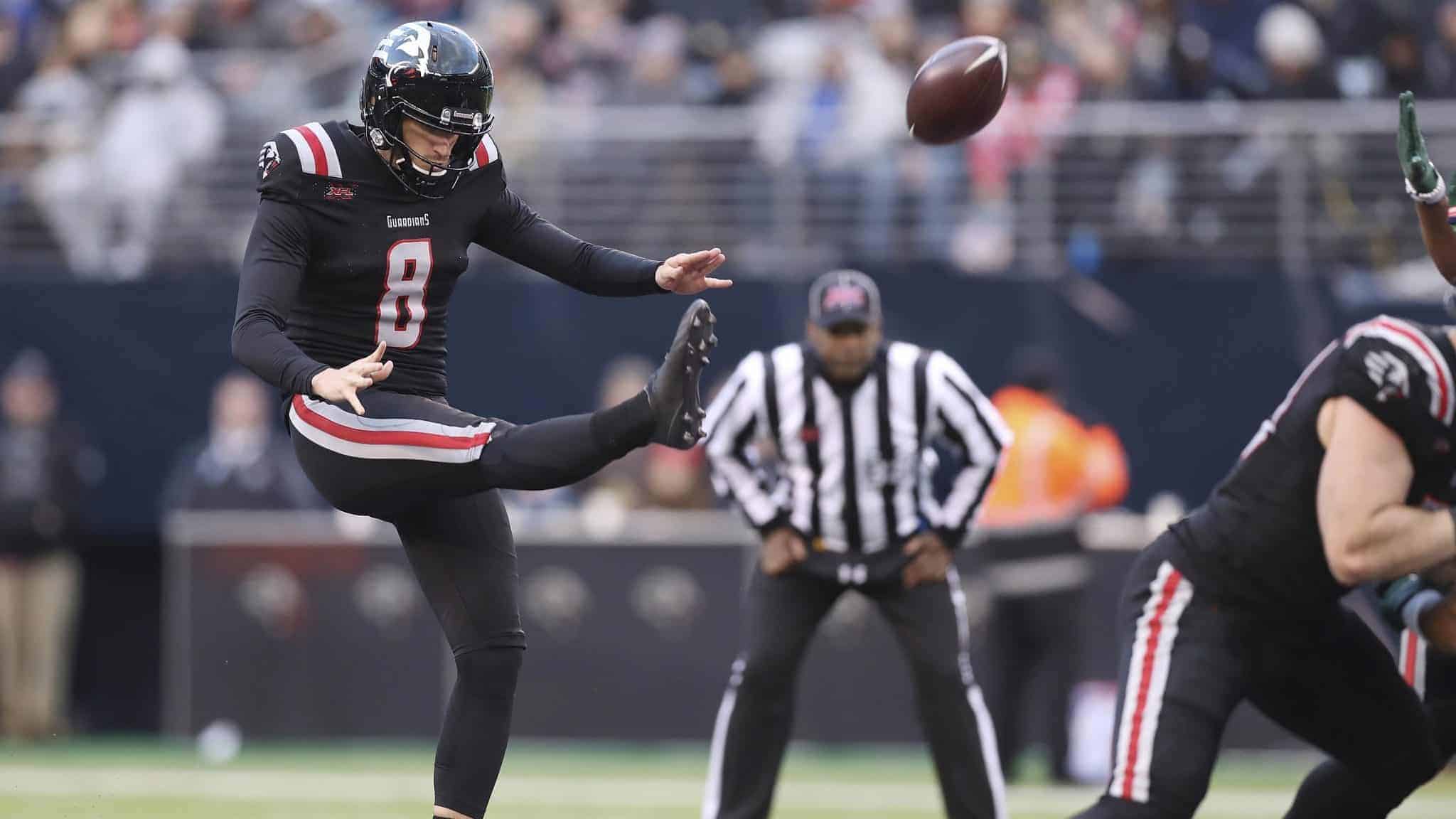 New York Guardians punter Justin Vogel (8) punts the ball away during an XFL football game against the Tampa Bay Vipers, Sunday, Feb. 9, 2020, in East Rutherford, N.J. The New York Guardians won 23-3.
