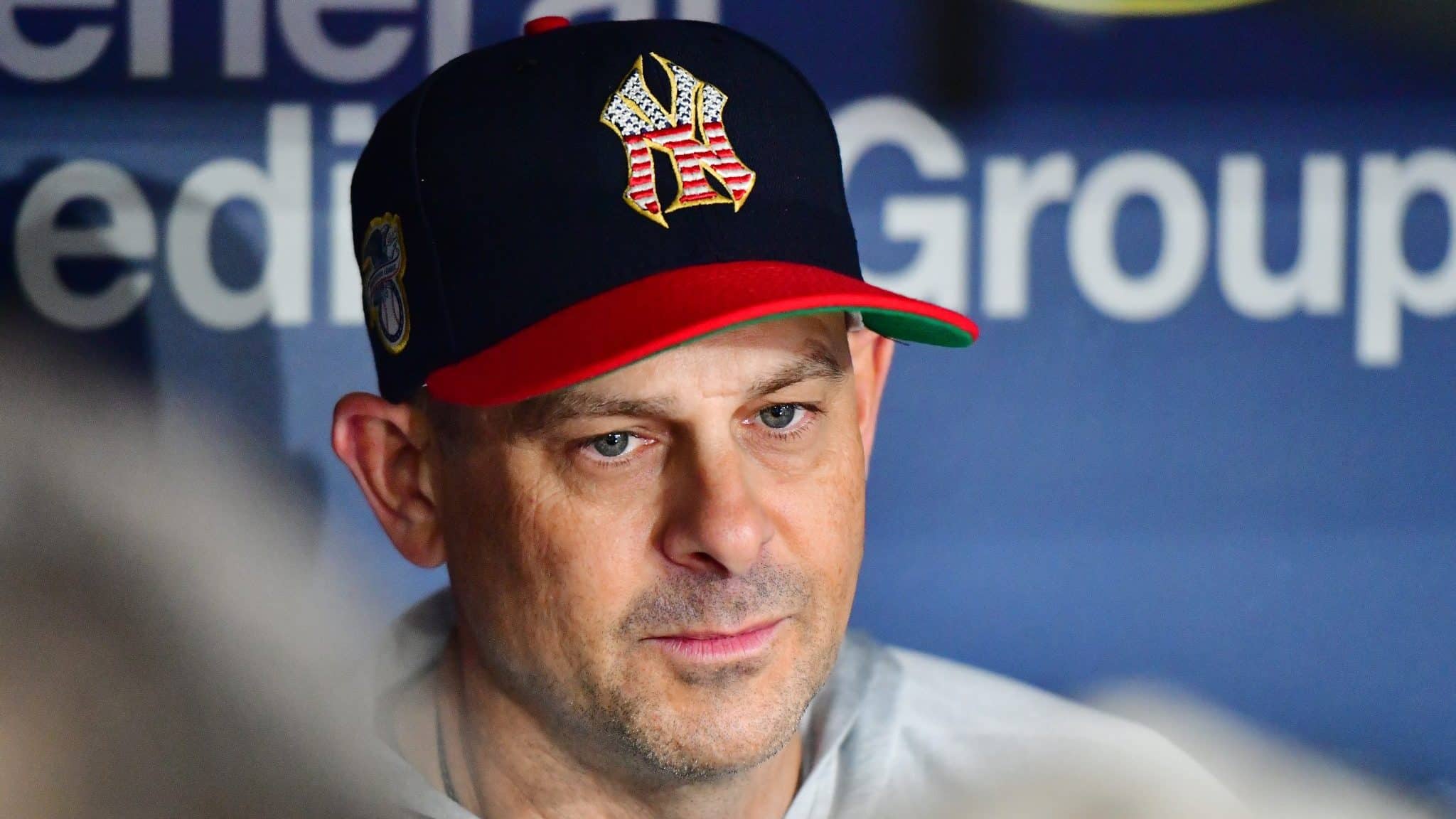ST. PETERSBURG, FLORIDA - JULY 04: Manager Aaron Boone #17 of the New York Yankees answers questions from reporters before a baseball game against the Tampa Bay Rays at Tropicana Field on July 04, 2019 in St. Petersburg, Florida.