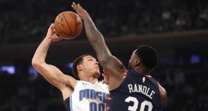 New York Knicks forward Julius Randle (30) blocks the shot of Orlando Magic forward Aaron Gordon (00) during the first half of an NBA basketball game, Thursday, Feb. 6, 2020, in New York.