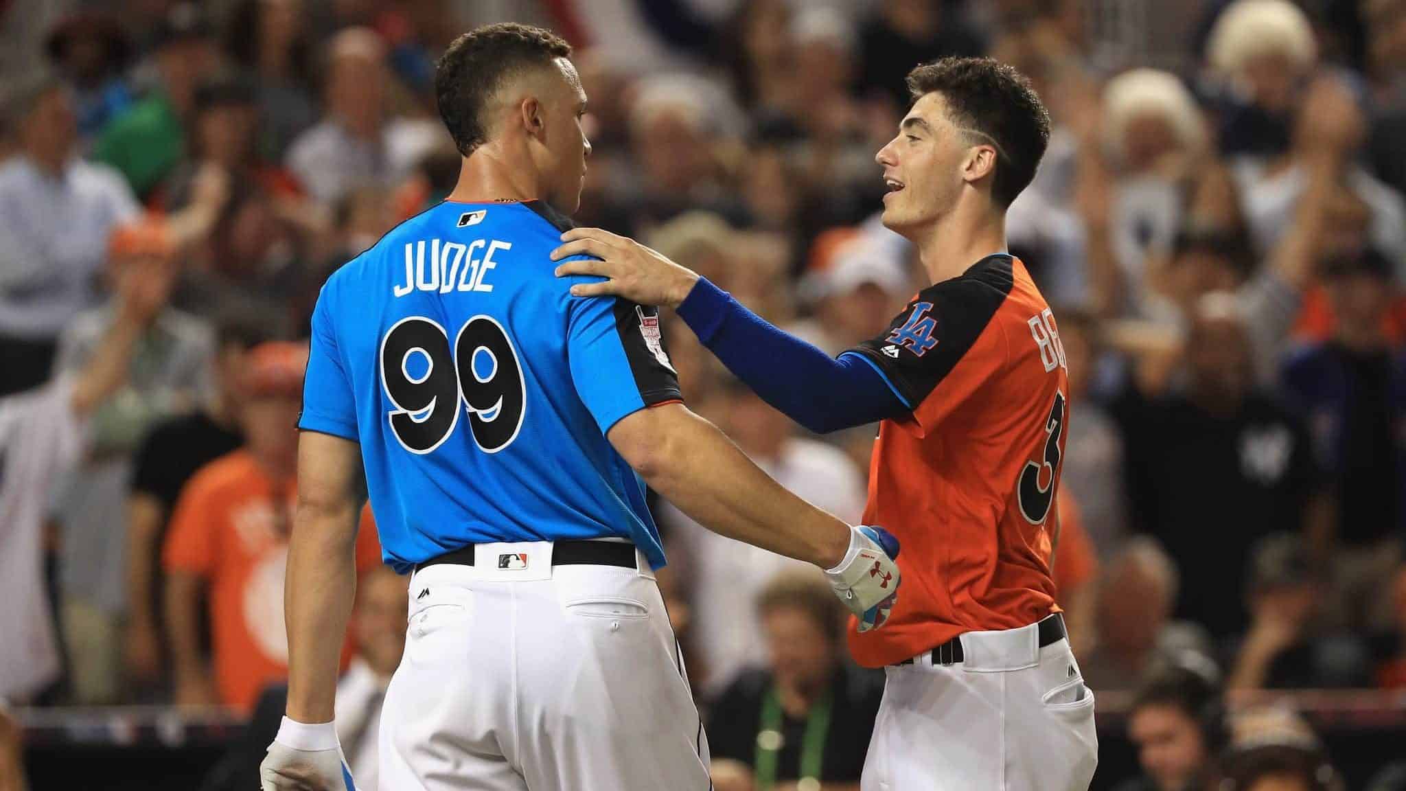 MIAMI, FL - JULY 10: Aaron Judge #99 of the New York Yankees hugs Cody Bellinger #35 of the Los Angeles Dodgers and the National League during the T-Mobile Home Run Derby at Marlins Park on July 10, 2017 in Miami, Florida.