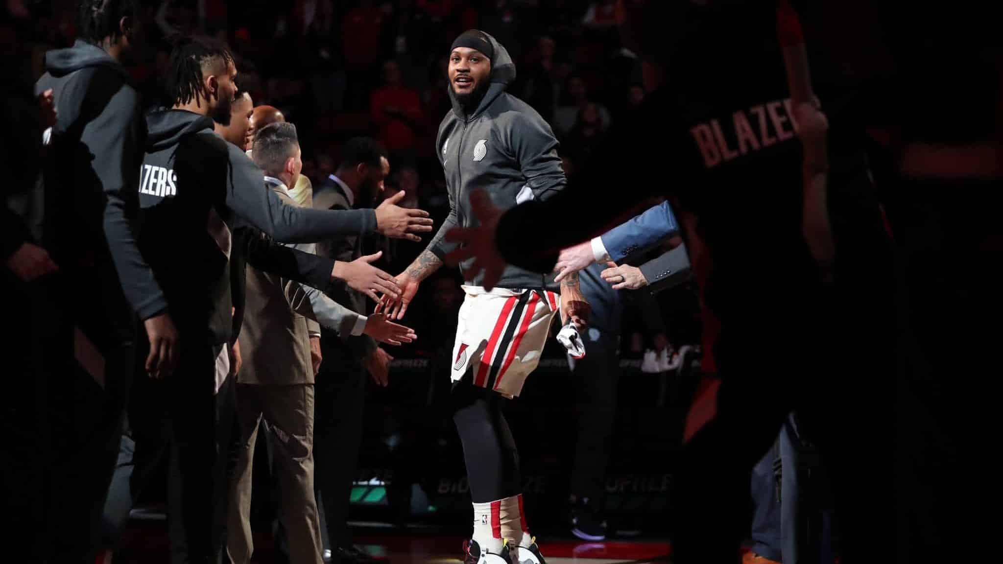 PORTLAND, OREGON - FEBRUARY 09: Carmelo Anthony #00 of the Portland Trail Blazers is introduced to the starting lineup prior to taking on the Miami Heat during their game at Moda Center on February 09, 2020 in Portland, Oregon. NOTE TO USER: User expressly acknowledges and agrees that, by downloading and or using this photograph, User is consenting to the terms and conditions of the Getty Images License Agreement.