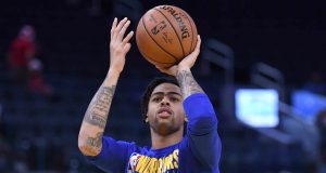 SAN FRANCISCO, CALIFORNIA - DECEMBER 25: D'Angelo Russell #0 of the Golden State Warriors warms up prior to the start of an NBA basketball game against the Houston Rockets at Chase Center on December 25, 2019 in San Francisco, California.