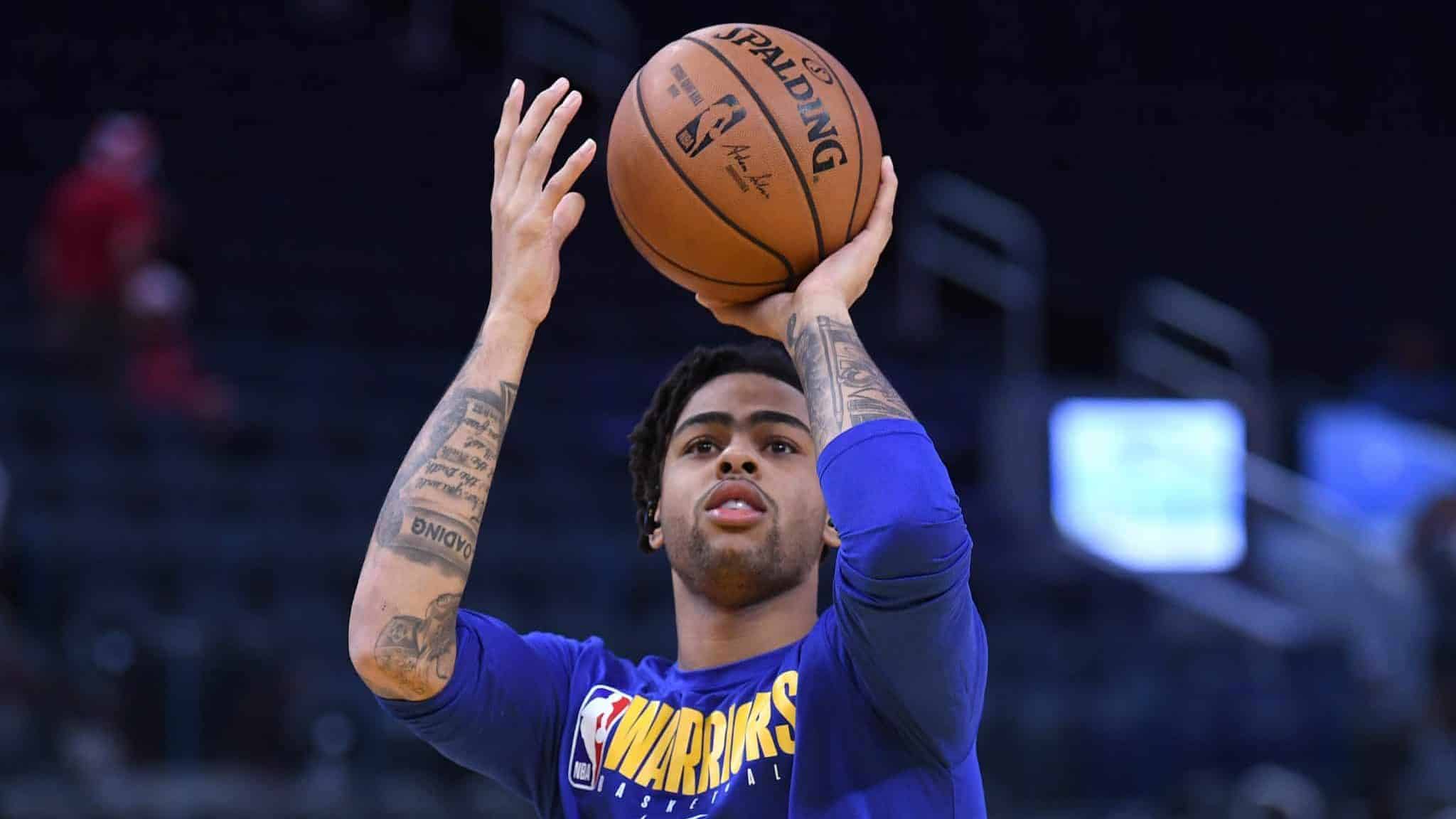 SAN FRANCISCO, CALIFORNIA - DECEMBER 25: D'Angelo Russell #0 of the Golden State Warriors warms up prior to the start of an NBA basketball game against the Houston Rockets at Chase Center on December 25, 2019 in San Francisco, California.