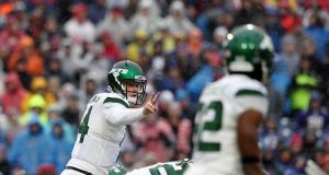 ORCHARD PARK, NEW YORK - DECEMBER 29: Sam Darnold #14 of the New York Jets signals during the first quarter of an NFL game against the Buffalo Bills at New Era Field on December 29, 2019 in Orchard Park, New York.