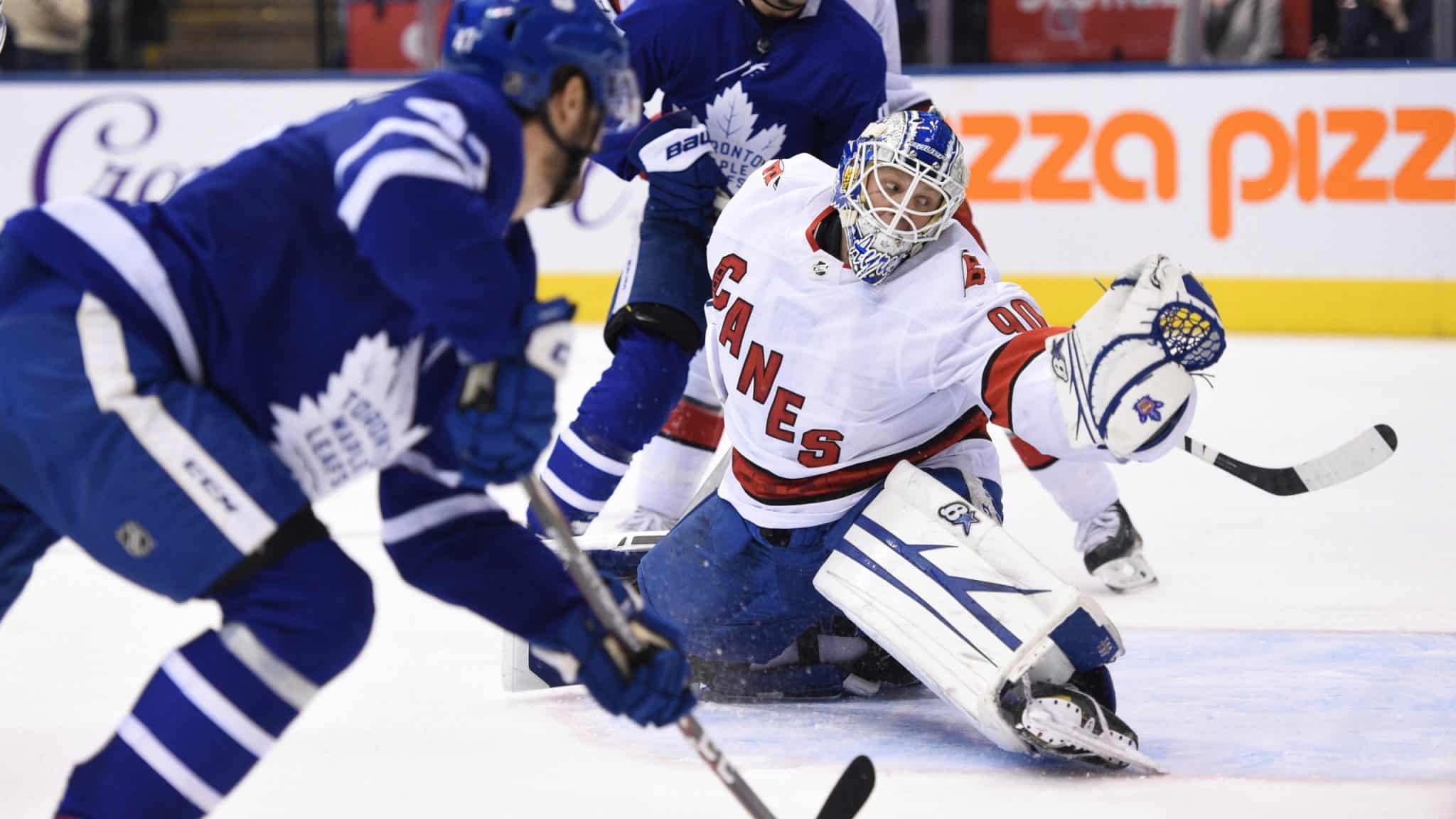 Toronto Maple Leafs left wing Pierre Engvall (47) scores his team's third goal of the game against Carolina Hurricanes emergency goalie David Ayres (90) during second-period NHL hockey game action in Toronto, Saturday, Feb. 22, 2020.