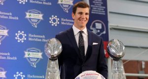 EAST RUTHERFORD, NEW JERSEY - JANUARY 24: Eli Manning of the New York Giants poses with the Vince Lombardi Trophies after a press conference to announce his retirement on January 24, 2020 at Quest Diagnostic Training Center in East Rutherford, New Jersey.The two time Super Bowl MVP is retiring after 16 seasons with the team.