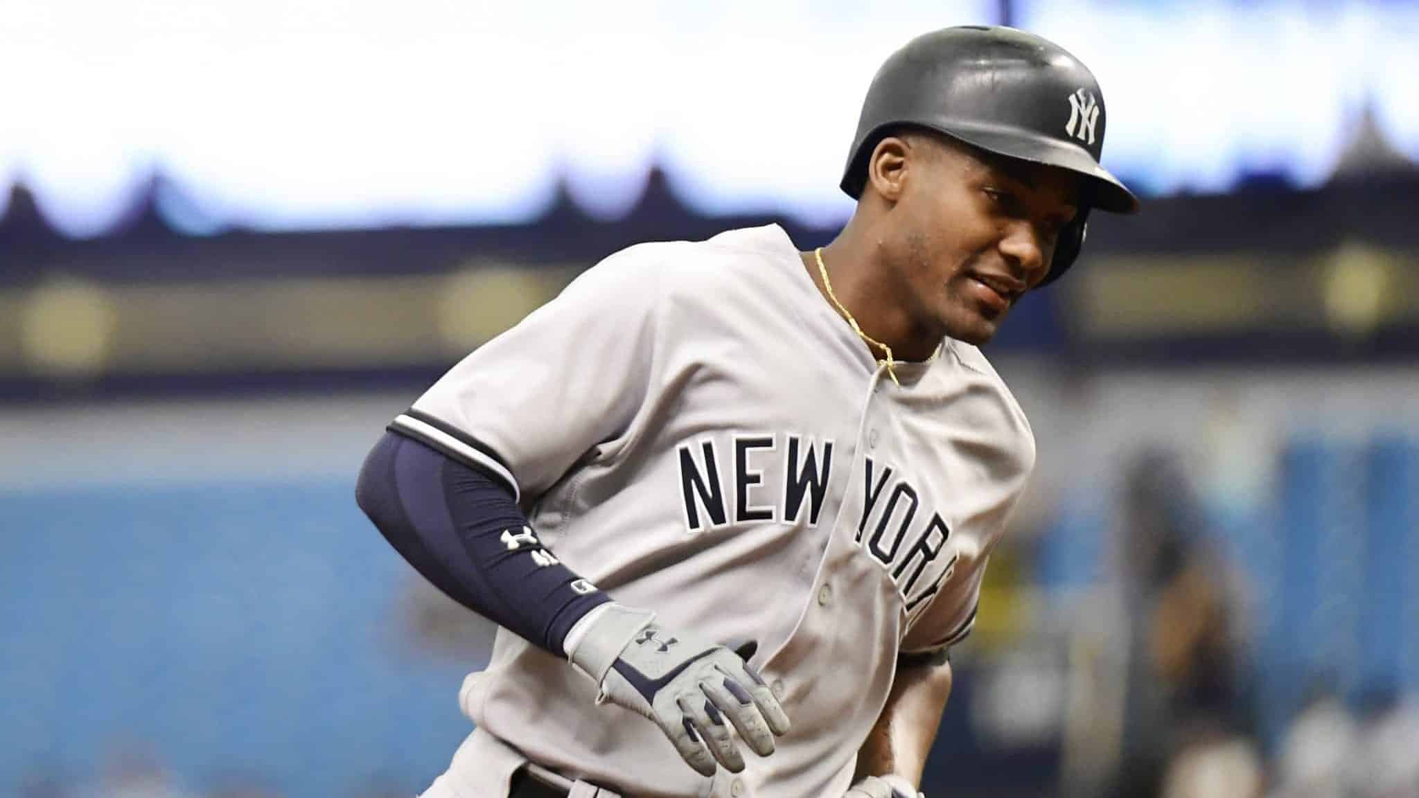 ST PETERSBURG, FL - SEPTEMBER 27: Miguel Andujar #41 of the New York Yankees hits a three-run homer in the first inning against the Tampa Bay Rays on September 27, 2018 at Tropicana Field in St Petersburg, Florida.