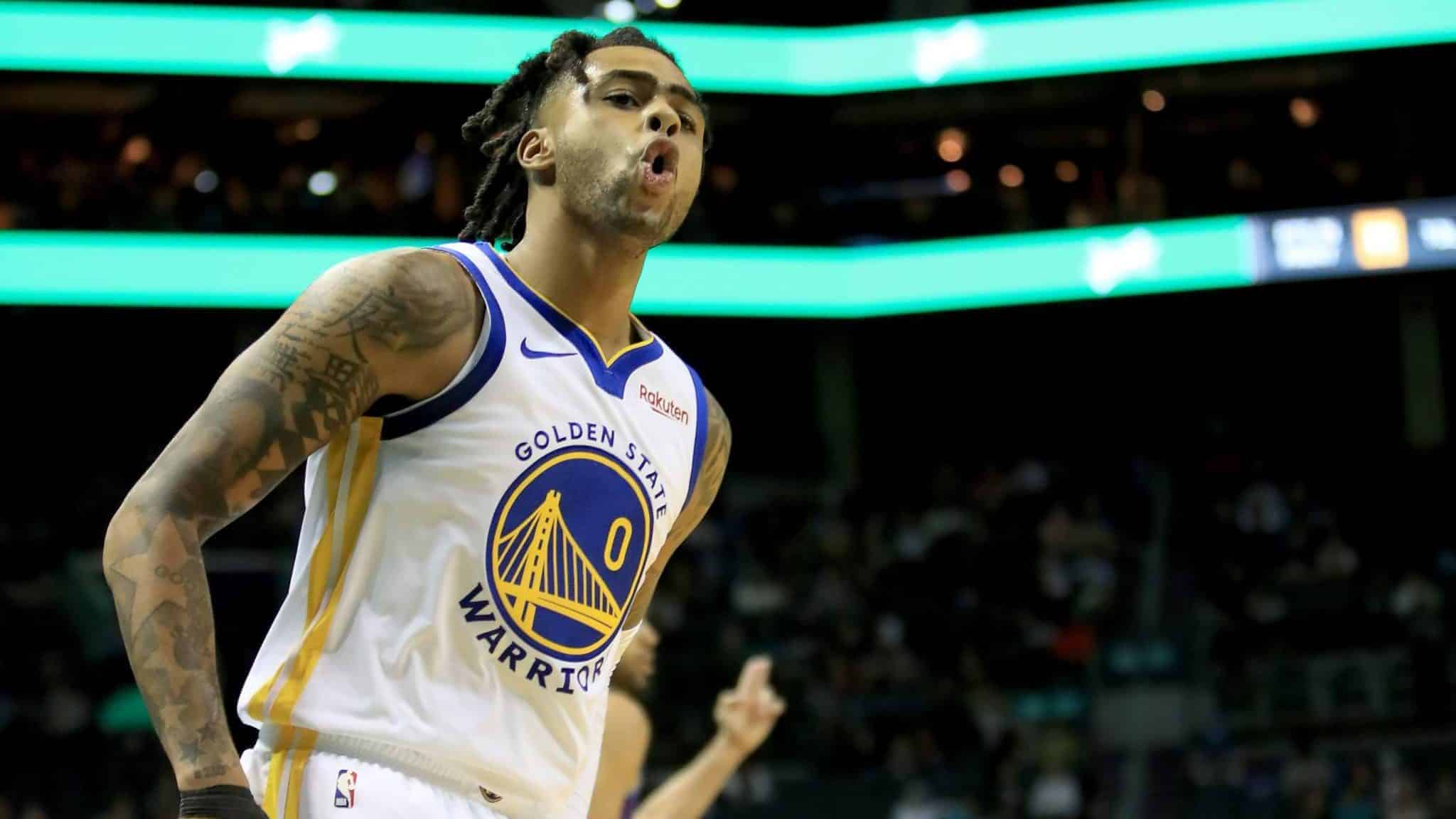 CHARLOTTE, NORTH CAROLINA - DECEMBER 04: D'Angelo Russell #0 of the Golden State Warriors reacts after making a basket against the Charlotte Hornets during their game at Spectrum Center on December 04, 2019 in Charlotte, North Carolina. NOTE TO USER: User expressly acknowledges and agrees that, by downloading and or using this photograph, User is consenting to the terms and conditions of the Getty Images License Agreement. (Photo by Streeter Lecka/Getty Images)