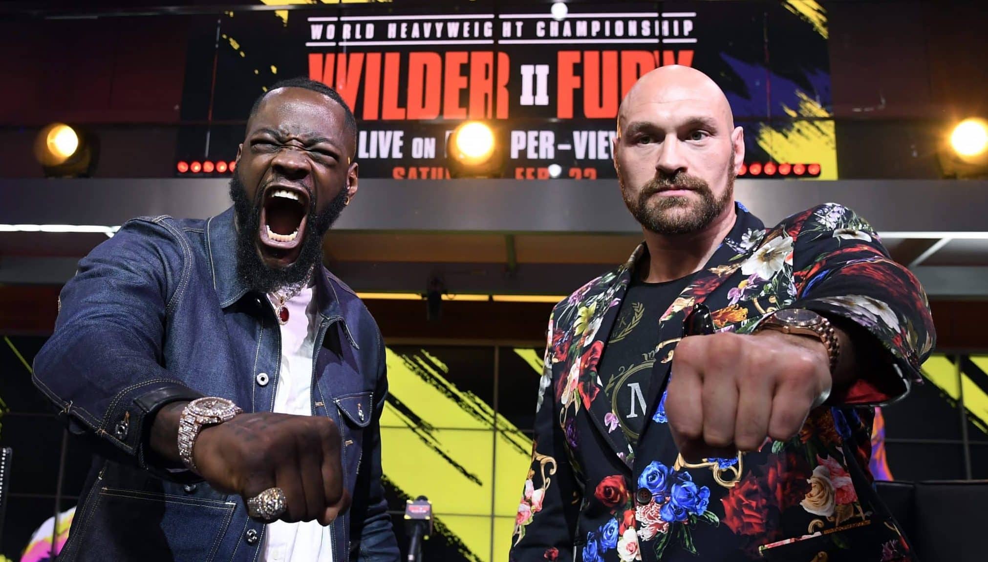 LOS ANGELES, CA - JANUARY 25: Deontay Wilder (L) and Tyson Fury face off during a news conference at Fox Studios on January 25, 2020 in Los Angeles, California.