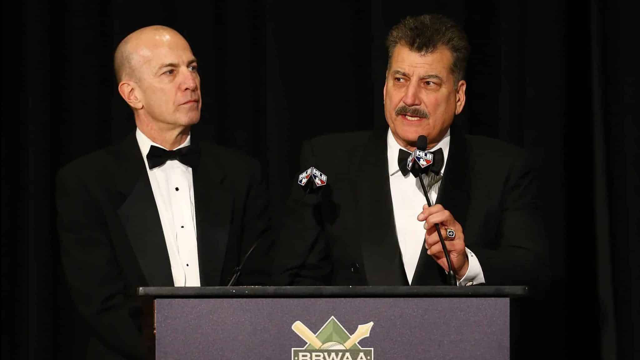 NEW YORK, NEW YORK - JANUARY 25: Gary Cohen and Keith Hernandez present Ron Darling with the Arthur and Milton Richman 